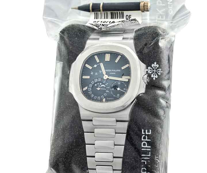 Patek Philippe 5712/1A-001, NAUTILUS RETAILED BY TIFFANY FACTORY SEALED